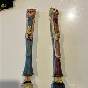 Source Unknown cast iron Cat Sculptures - Blue and Pink